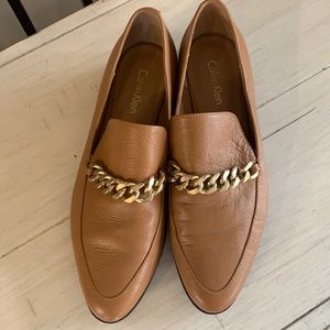 Calvin Klein ran leather loafers.